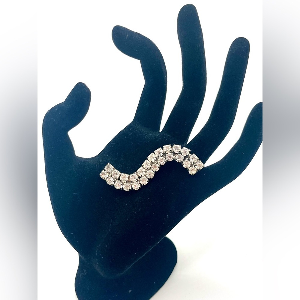 Vintage rhinestone wave brooch silver tone mid century
